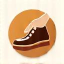 Icono de un zapato puliéndose, representando el refinado acabado manual.